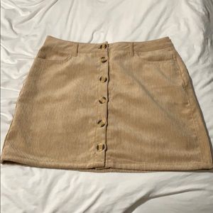 Tan mini skirt